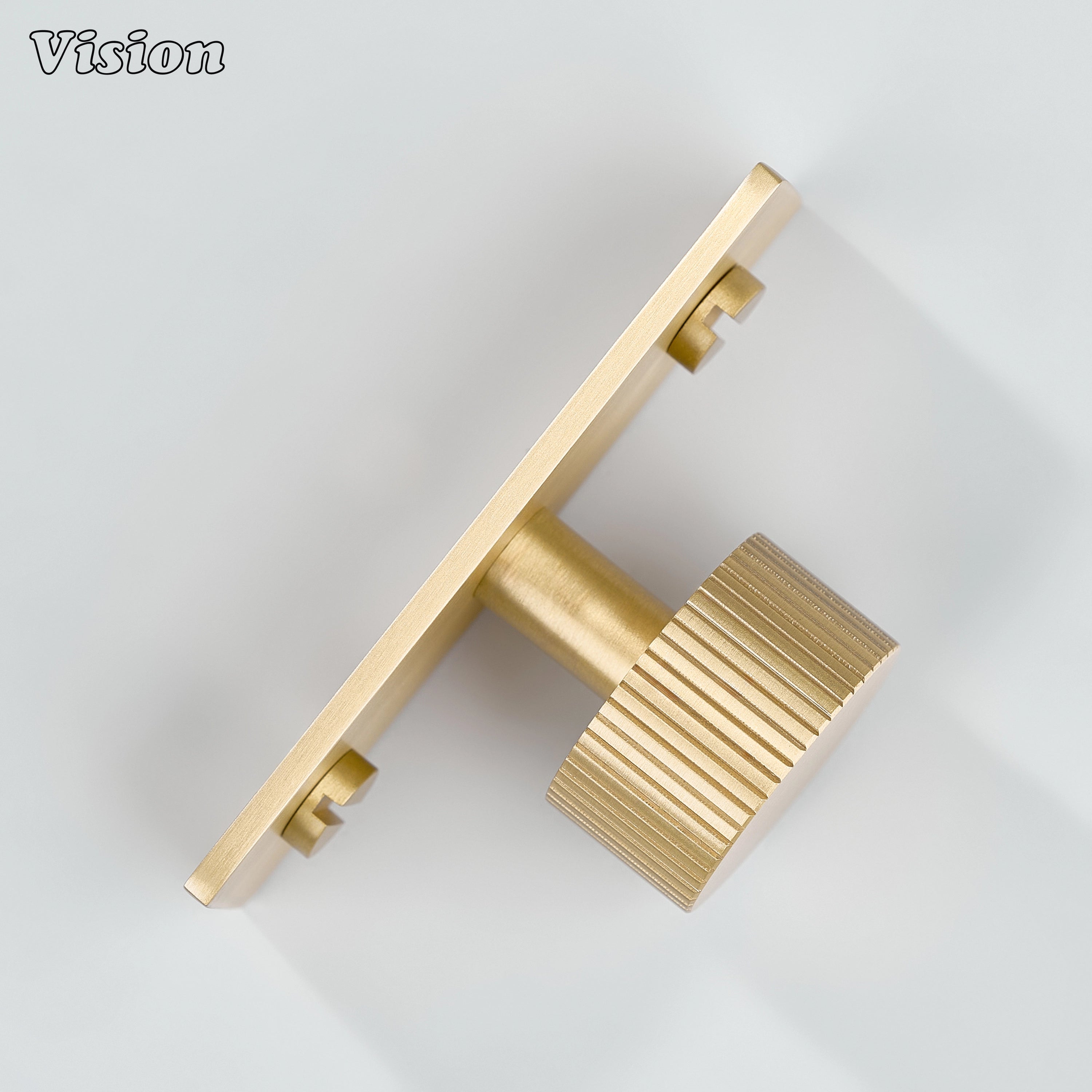 Gold round cabinet knob with linear knurling and backplate for modular kitchens