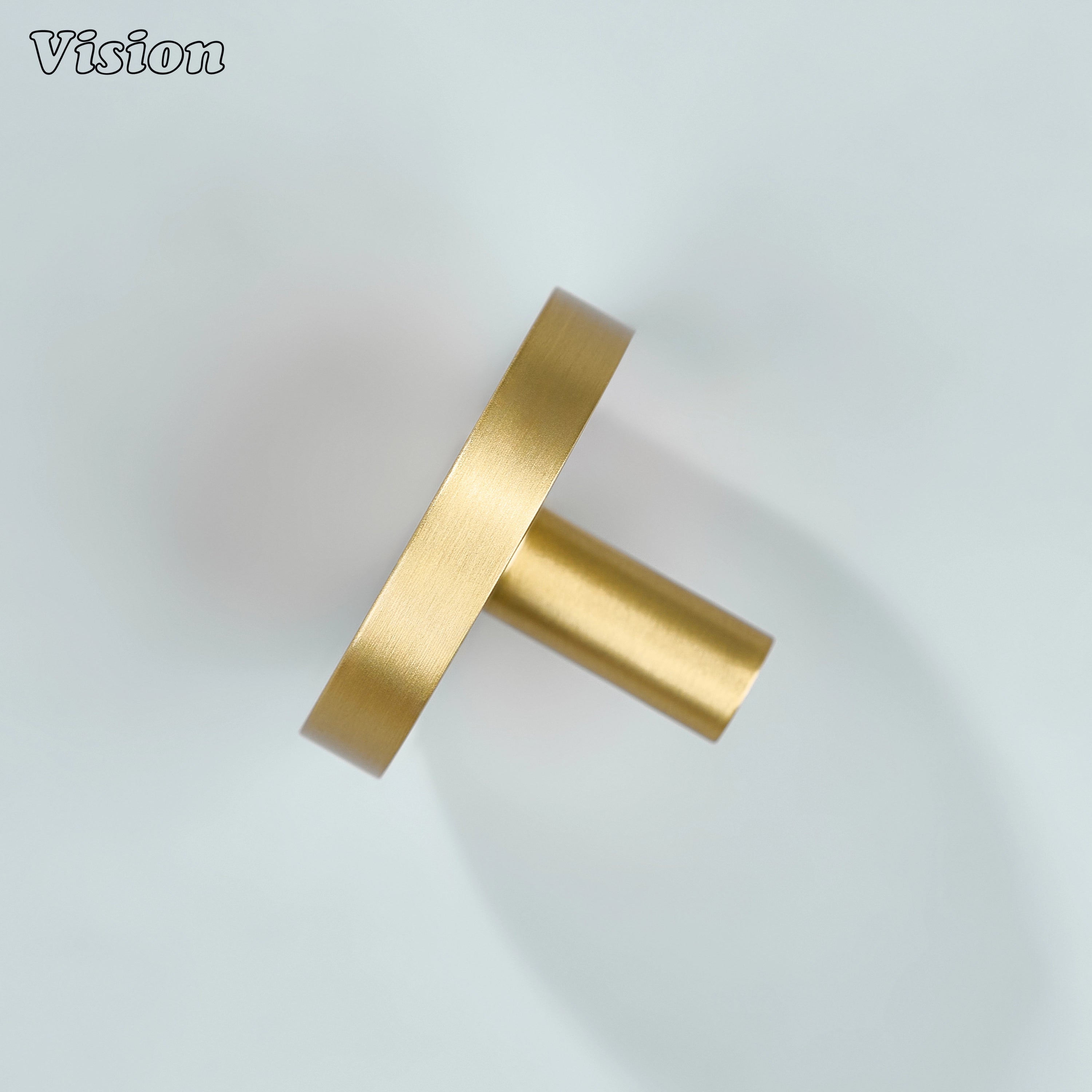 Gold round profile cabinet knob with cylindrical base for kitchen drawers