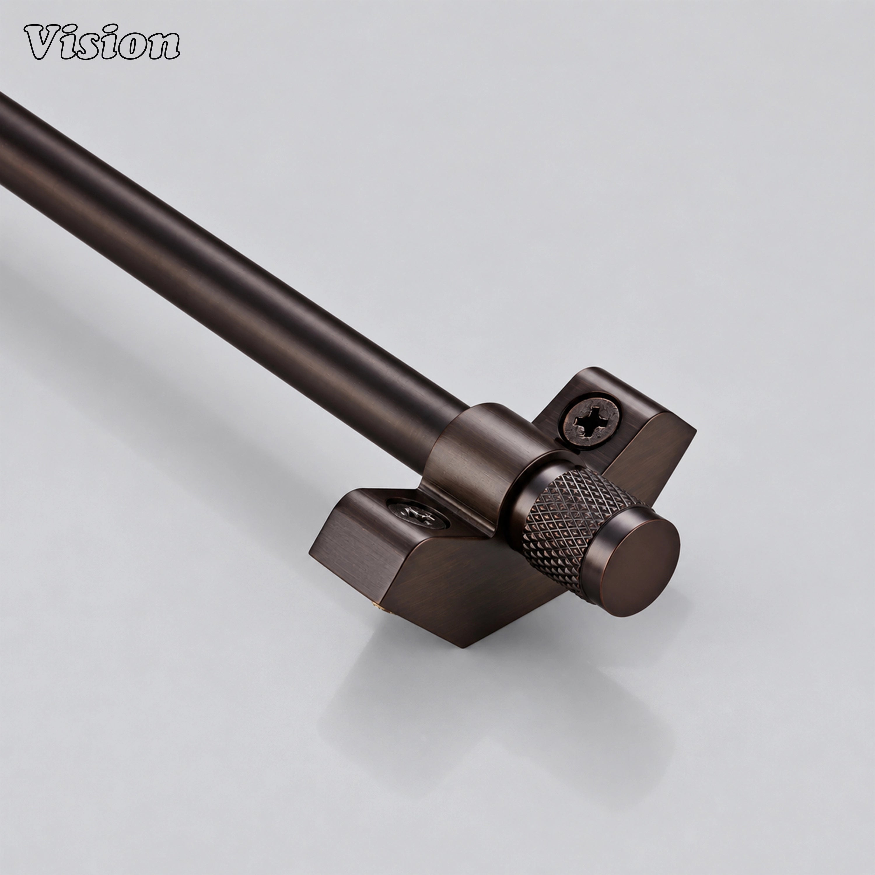 Architectural oil rubbed bronze stair carpet rod featuring knurled end caps on residential stairs