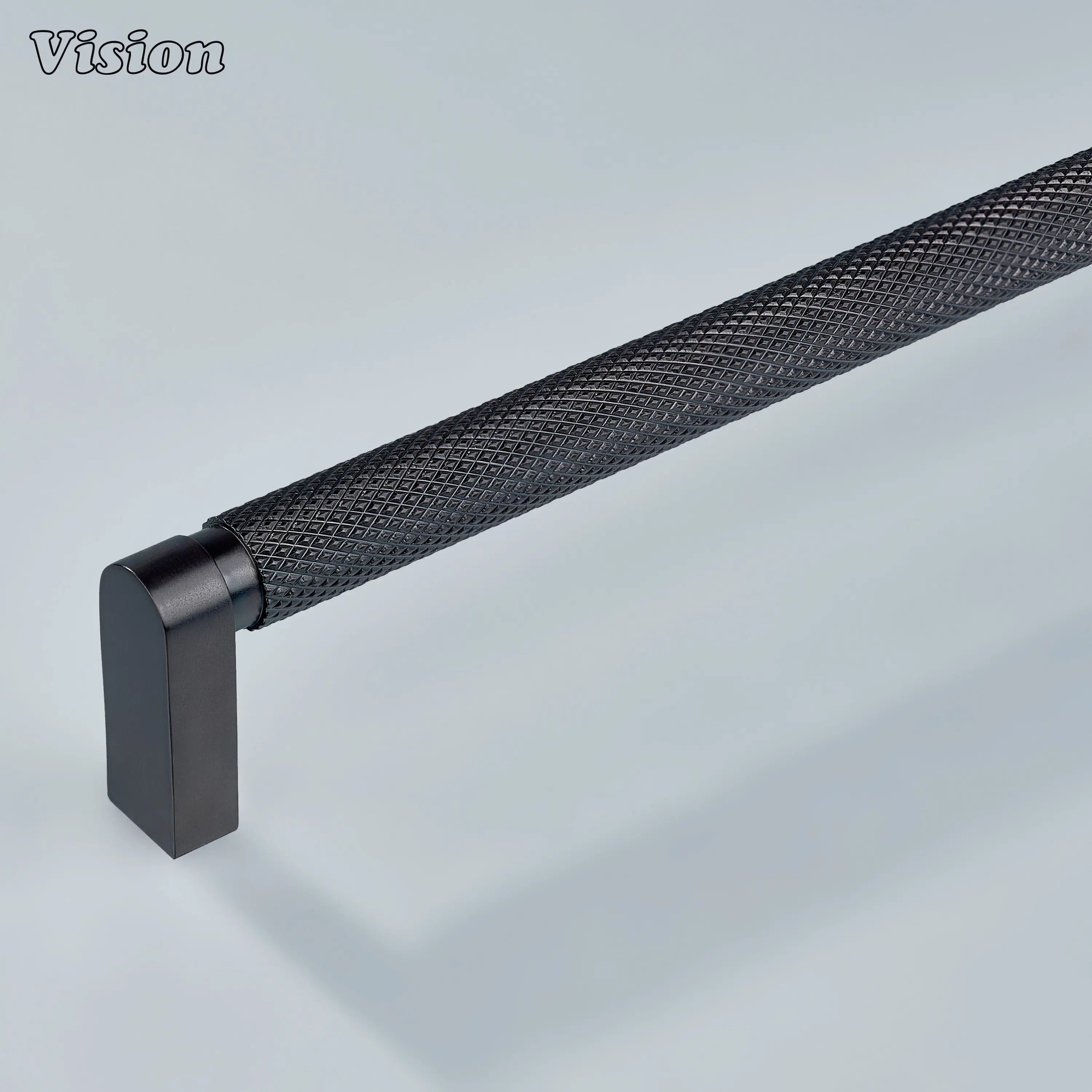 Modern oil rubbed bronze ripple knurled handle used for kitchen cabinets.