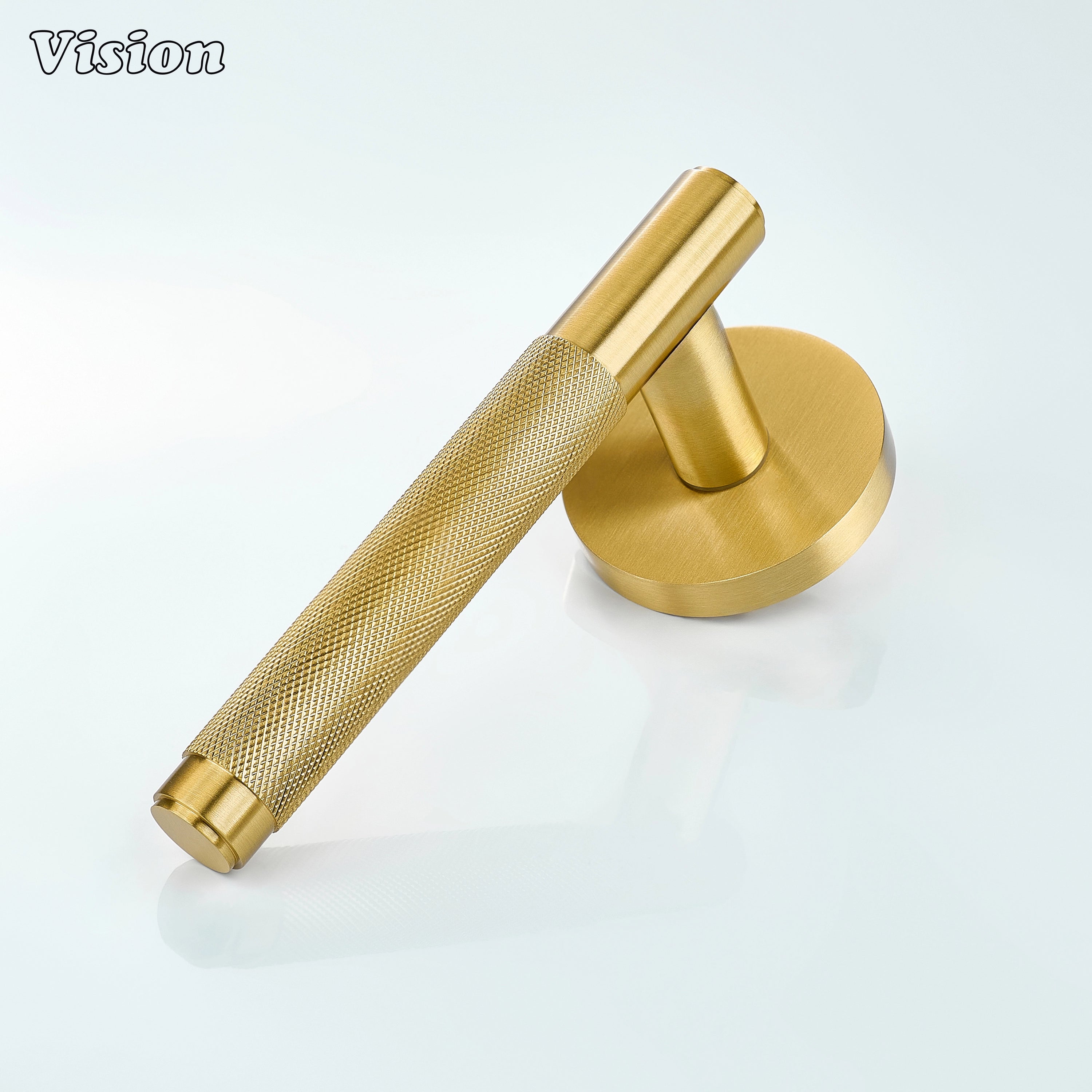 Solid brass gold door lever handle with textured grip for home interiors.