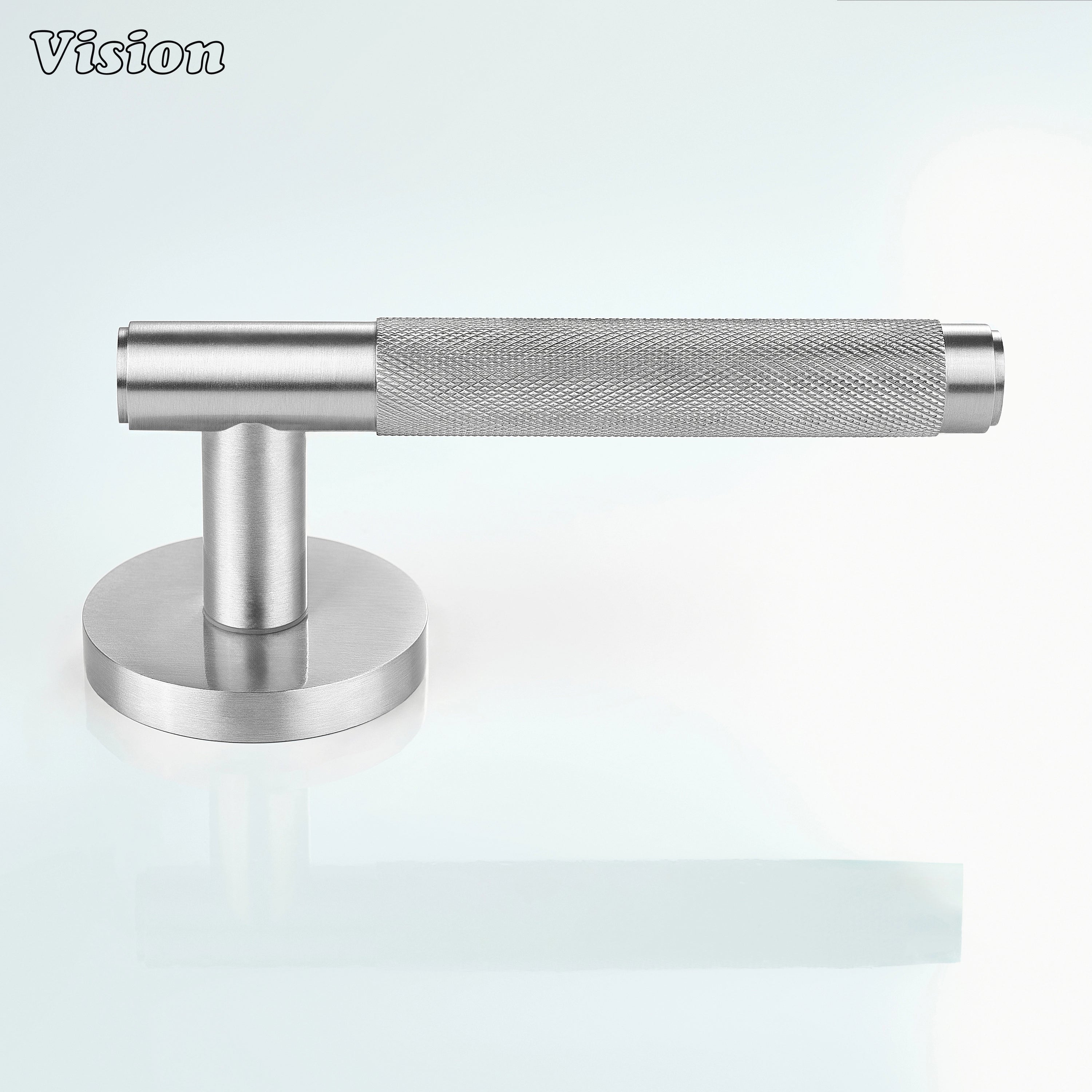 Silver knurled door handle installed on a modern bedroom door.